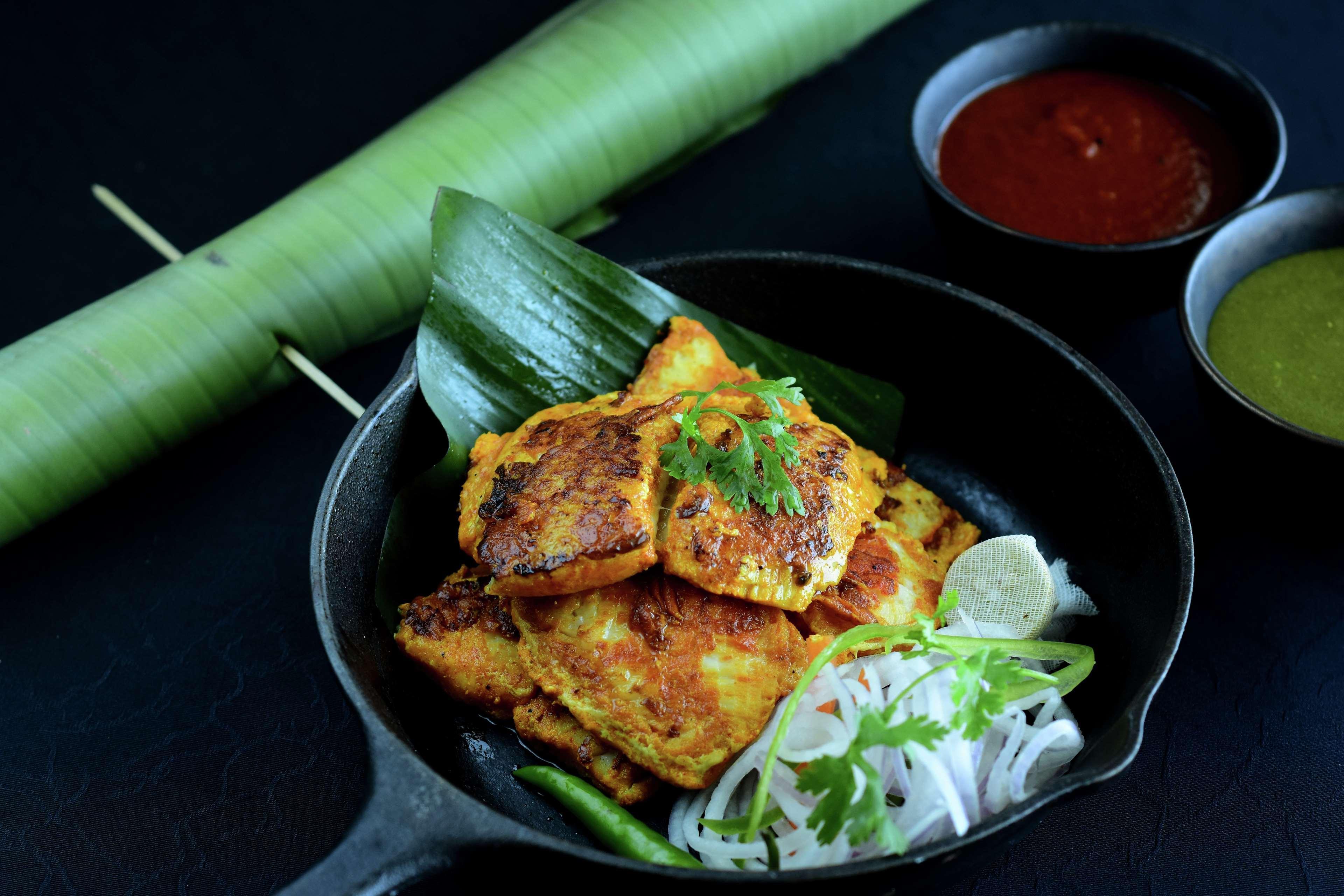 Hilton Mumbai International Airport Hotel Exterior foto A plate of opek